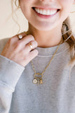 Radiant Cross Charm