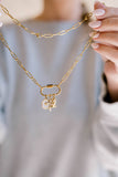 Radiant Cross Charm